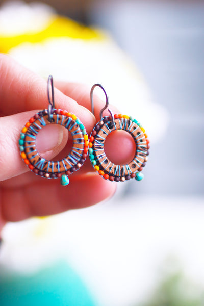 Southwestern Sun Dial beaded and leather earrings