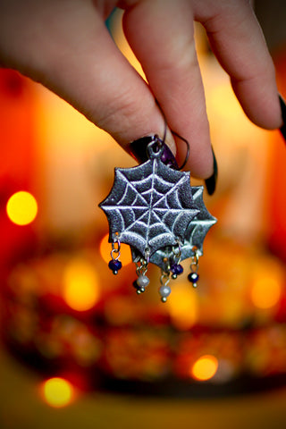 Sparkly Spiderweb Earrings with white and purple dangles