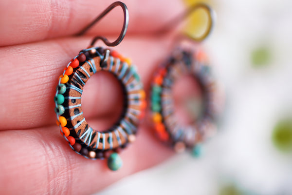 Southwestern Sun Dial beaded and leather earrings