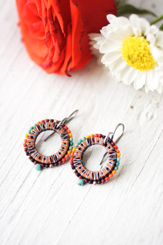 Southwestern Sun Dial beaded and leather earrings