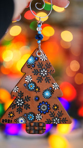 A Snowy Blue Christmas Tree Ornament