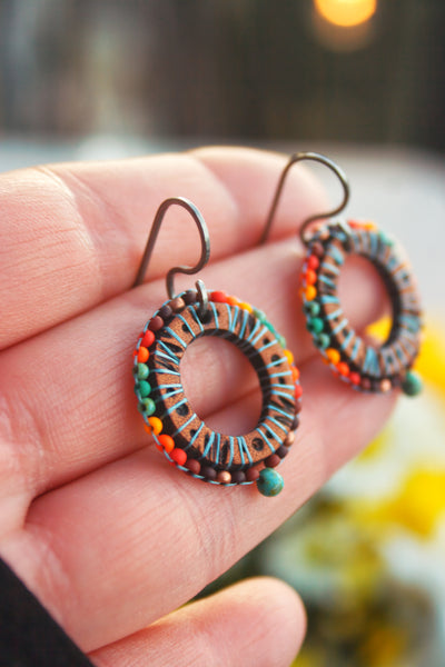 Southwestern Sun Dial beaded and leather earrings